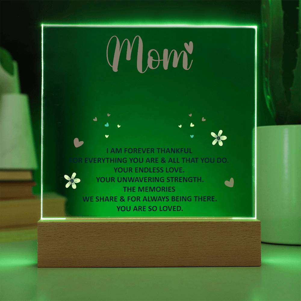 Mother appreciation LED desk lamp: “Endless love, unwavering strength” quote on acrylic sheet with pink hearts, corded light base.